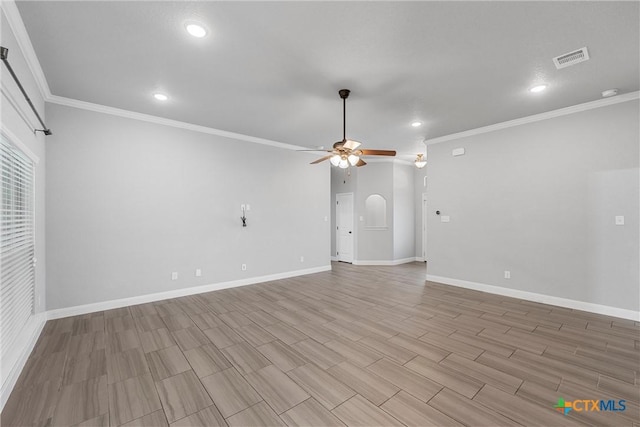 3305 Crystal Ann Dr, Temple, TX 76502 - unfurnished living room featuring a ceiling fan, crown molding, recessed lighting, wood finished floors, and arched walkways