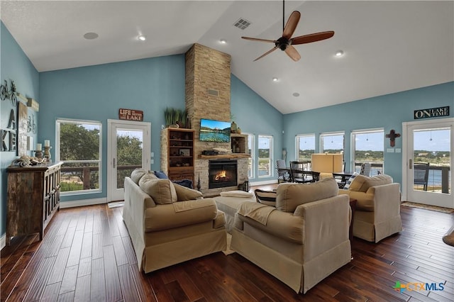 2611 Westview Dr, Canyon Lake, TX 78133 - living room with high vaulted ceiling, a ceiling fan, dark wood-style flooring, a fireplace, and recessed lighting
