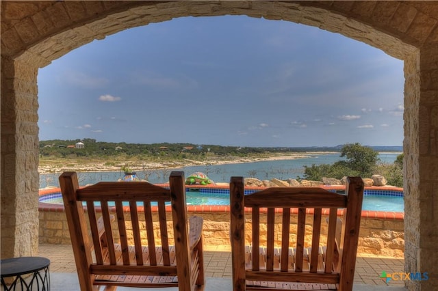 2611 Westview Dr, Canyon Lake, TX 78133 - wooden terrace featuring a water view and an outdoor pool
