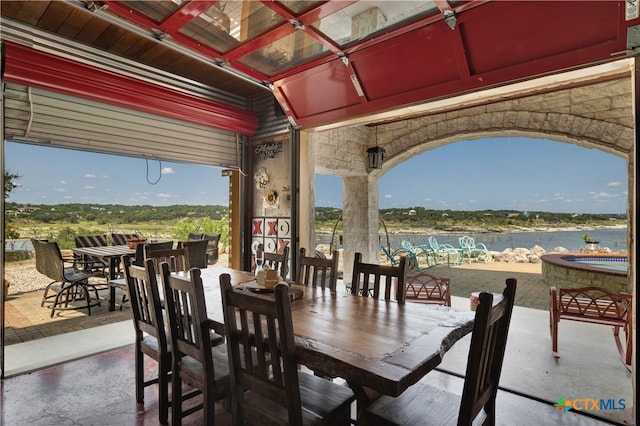 view of patio / terrace with a water view