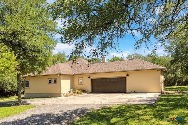 155 Woodrow Center Rd, Kingsbury, TX 78638 - view of front facade featuring a garage, driveway, stucco siding, a chimney, and a front lawn