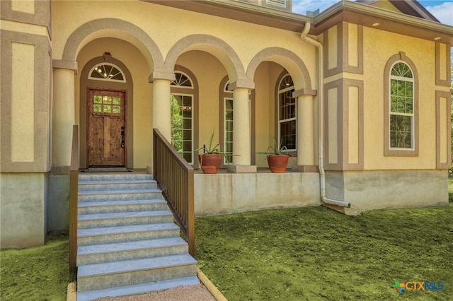 155 Woodrow Center Rd, Kingsbury, TX 78638 - property entrance featuring stucco siding and covered porch