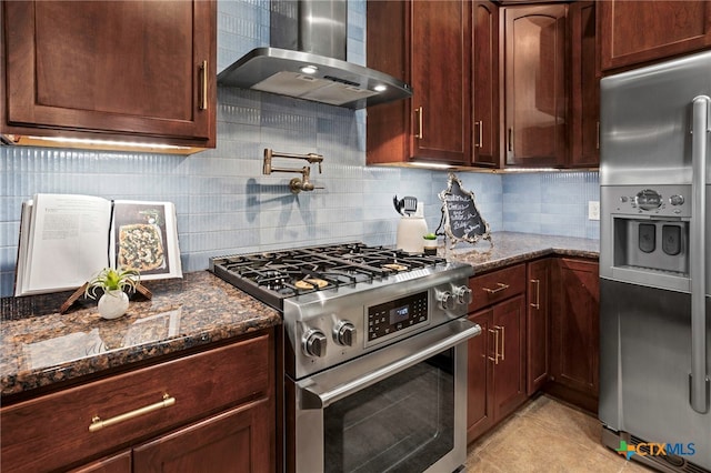 155 Woodrow Center Rd, Kingsbury, TX 78638 - kitchen with appliances with stainless steel finishes, wall chimney exhaust hood, dark stone countertops, and decorative backsplash