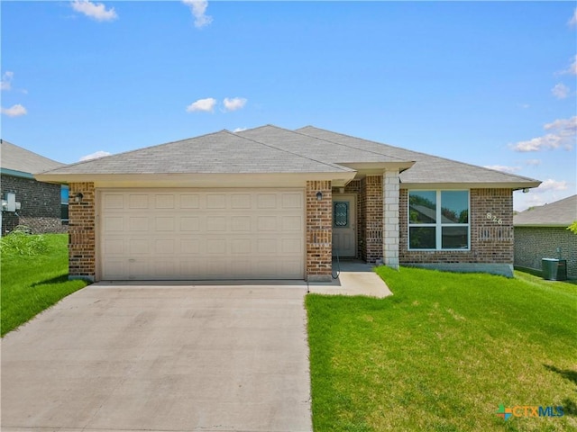 ranch-style house with cooling unit, brick siding, concrete driveway, an attached garage, and a front yard