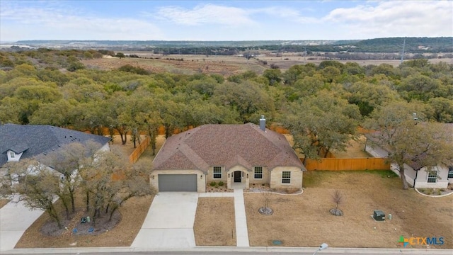 4117 Turning Leaf Dr, Nolanville, TX 76559 - unfurnished bedroom featuring ceiling fan, ensuite bath, dark hardwood / wood-style flooring, and a barn door