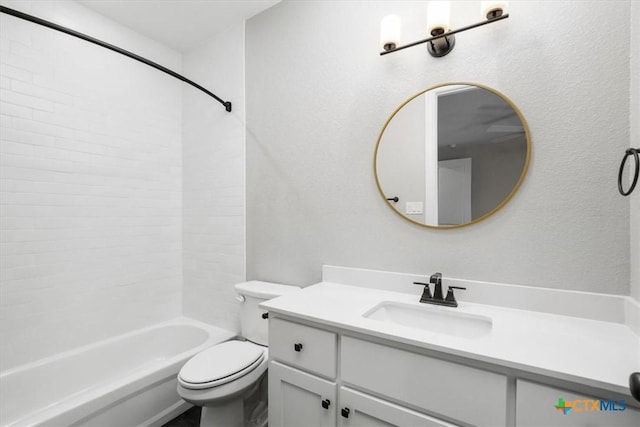 full bathroom featuring vanity, tub / shower combination, and toilet