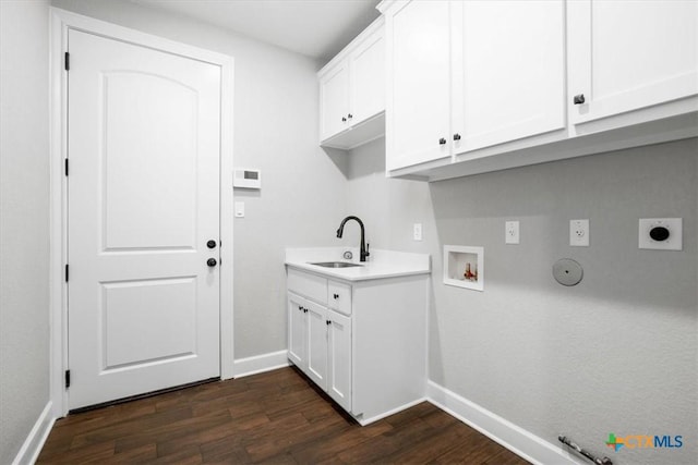 laundry room with cabinets, hookup for an electric dryer, hookup for a washing machine, sink, and hookup for a gas dryer