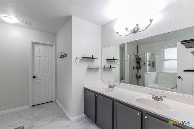 5304 Oster Dr, Killeen, TX 76542 - bathroom with baseboards, a shower stall, a textured ceiling, marble finish floors, and a bath