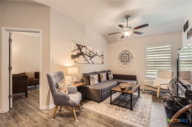 3256 Pablo Cir, Round Rock, TX 78665 - living room with wood finished floors, ceiling fan, baseboards, and vaulted ceiling