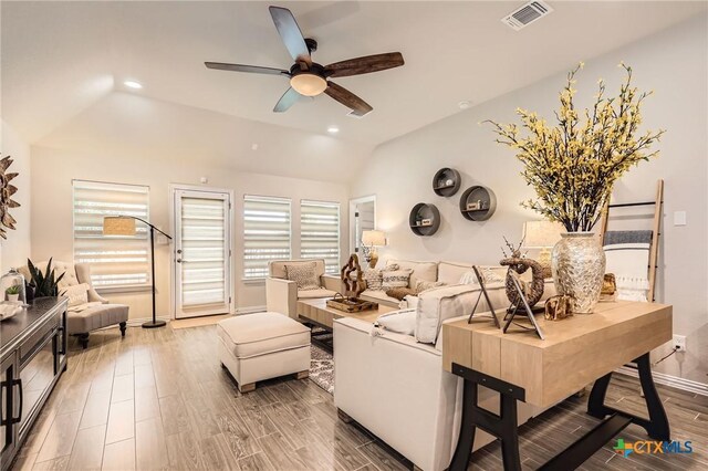 3256 Pablo Cir, Round Rock, TX 78665 - living room featuring vaulted ceiling, a ceiling fan, baseboards, wood finished floors, and recessed lighting