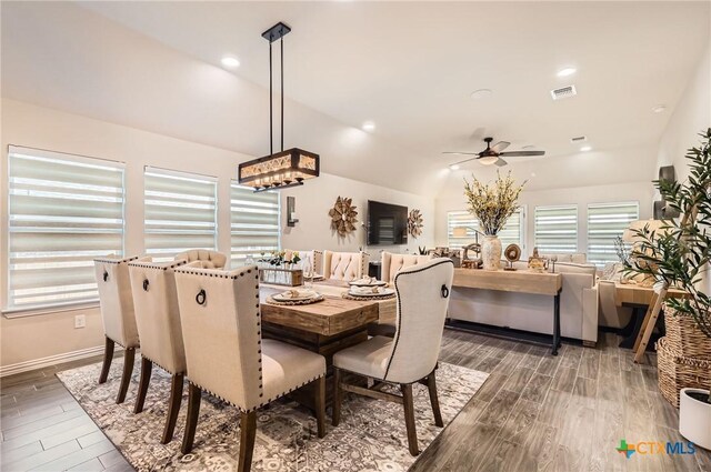 3256 Pablo Cir, Round Rock, TX 78665 - dining area featuring wood finished floors, a ceiling fan, lofted ceiling, and baseboards