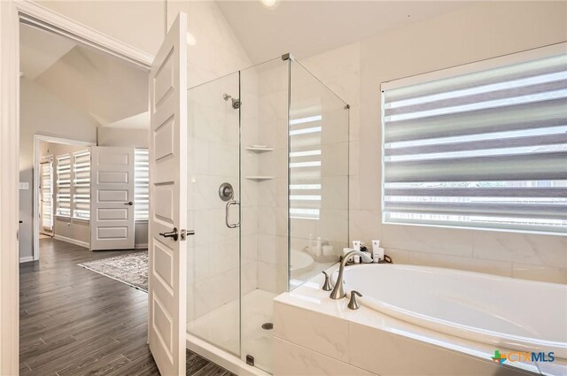3256 Pablo Cir, Round Rock, TX 78665 - full bathroom with a garden tub, a shower stall, and wood finished floors