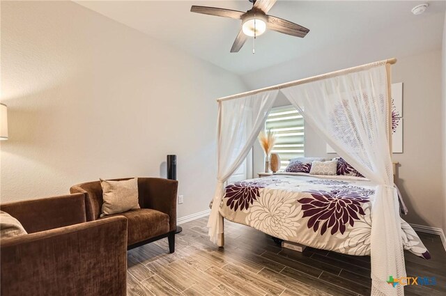 3256 Pablo Cir, Round Rock, TX 78665 - bedroom featuring wood finished floors, baseboards, a ceiling fan, and vaulted ceiling