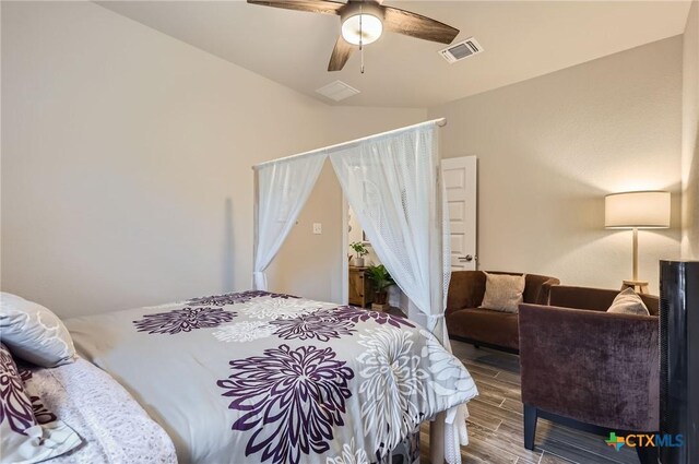 3256 Pablo Cir, Round Rock, TX 78665 - bedroom with wood finished floors and ceiling fan