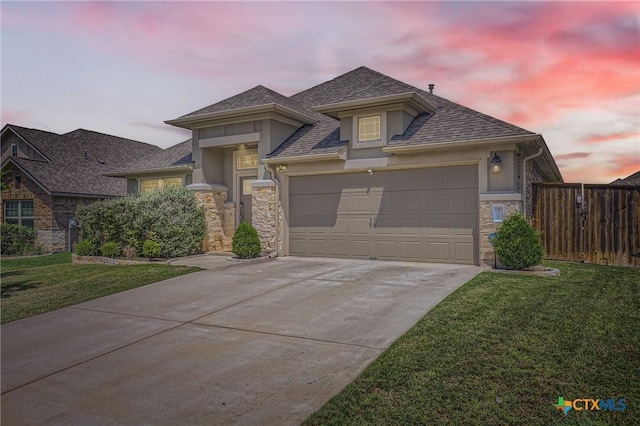3256 Pablo Cir, Round Rock, TX 78665 - view of front of house featuring stone siding, stucco siding, an attached garage, concrete driveway, and roof with shingles