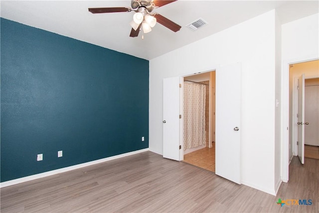 1217 Roanoke Dr, Temple, TX 76504 - unfurnished bedroom featuring wood finished floors and a ceiling fan