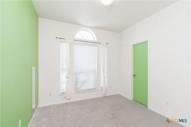 1217 Roanoke Dr, Temple, TX 76504 - spare room featuring carpet floors and baseboards