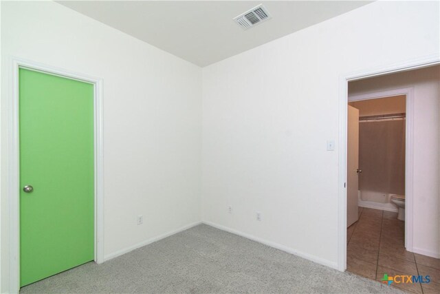1217 Roanoke Dr, Temple, TX 76504 - unfurnished bedroom featuring baseboards and carpet floors