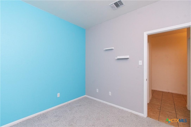 1217 Roanoke Dr, Temple, TX 76504 - unfurnished room with baseboards and carpet flooring