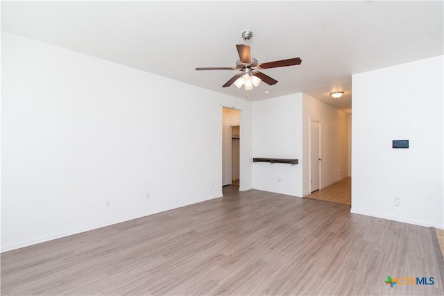 1217 Roanoke Dr, Temple, TX 76504 - unfurnished room with light wood-style flooring and ceiling fan
