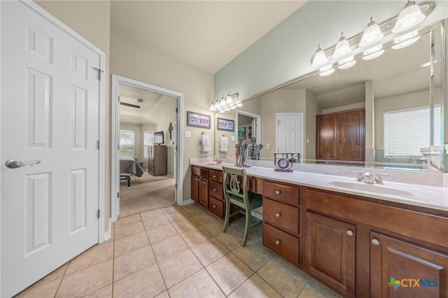 8717 Surrey Ct, Temple, TX 76502 - ensuite bathroom with double vanity and tile patterned flooring