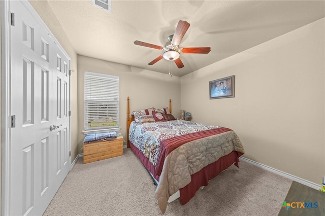 8717 Surrey Ct, Temple, TX 76502 - carpeted bedroom featuring ceiling fan and a closet