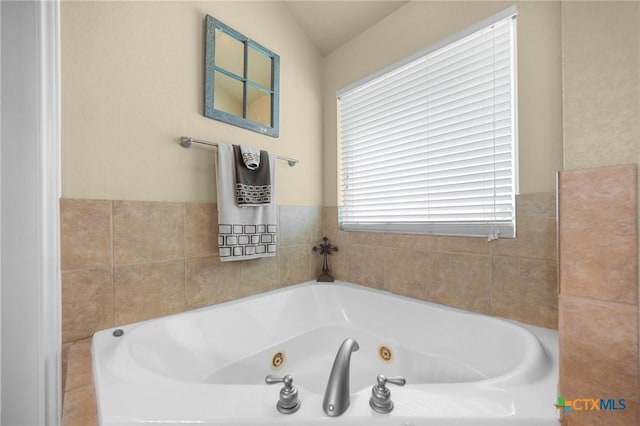 8717 Surrey Ct, Temple, TX 76502 - full bathroom featuring a whirlpool tub