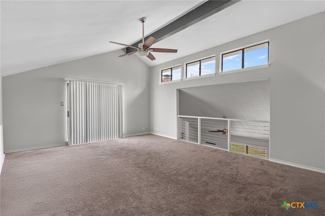 unfurnished living room with lofted ceiling with beams, ceiling fan, and carpet flooring