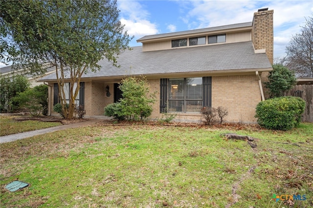 view of front of home with a front lawn