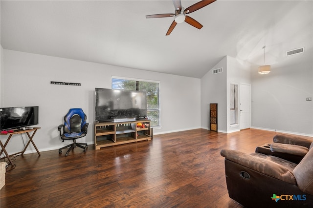 living room with ceiling fan, lofted ceiling, and dark hardwood / wood-style flooring