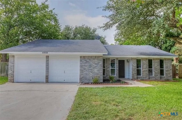 4302 Prairie Dr, Killeen, TX 76543 - ranch-style house with an attached garage and driveway