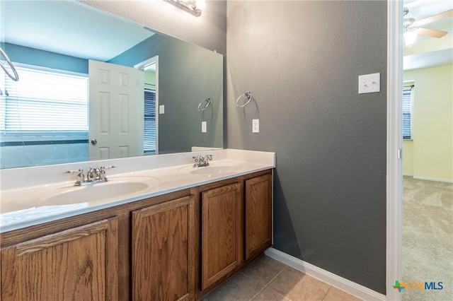 bathroom with vanity, ceiling fan, and tile patterned floors