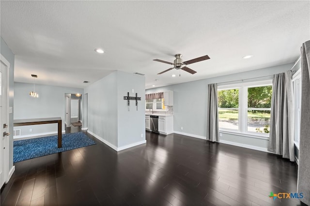 1600 N Beal St, Belton, TX 76513 - unfurnished living room featuring ceiling fan, dark wood-style flooring, and recessed lighting