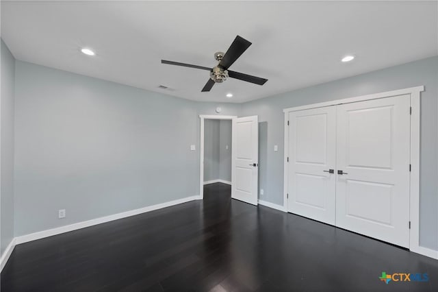 1600 N Beal St, Belton, TX 76513 - unfurnished bedroom with dark wood finished floors, recessed lighting, a closet, and a ceiling fan