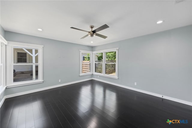 1600 N Beal St, Belton, TX 76513 - unfurnished room with a ceiling fan, dark wood-style floors, and recessed lighting