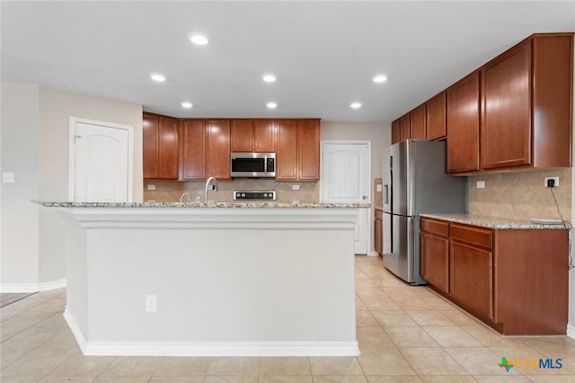 3907 Gentle Mdw, New Braunfels, TX 78130 - kitchen with stainless steel appliances, tasteful backsplash, recessed lighting, and light tile patterned floors