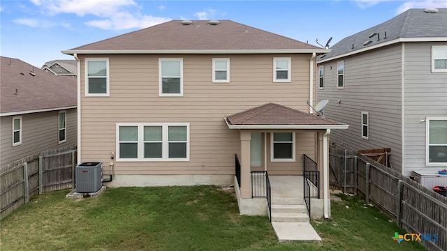 3907 Gentle Mdw, New Braunfels, TX 78130 - back of house with cooling unit and a shingled roof