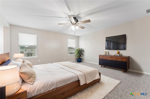 3907 Gentle Mdw, New Braunfels, TX 78130 - bedroom featuring light carpet, baseboards, and a ceiling fan
