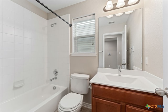 3907 Gentle Mdw, New Braunfels, TX 78130 - full bathroom featuring toilet, vanity, and shower / washtub combination