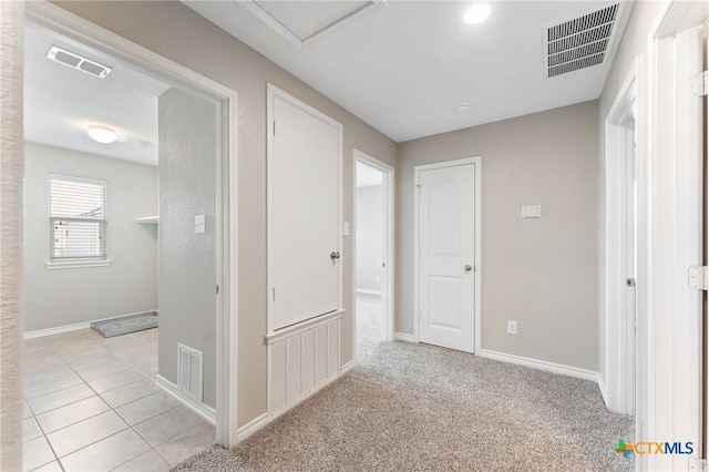 3907 Gentle Mdw, New Braunfels, TX 78130 - hall with baseboards and light tile patterned flooring
