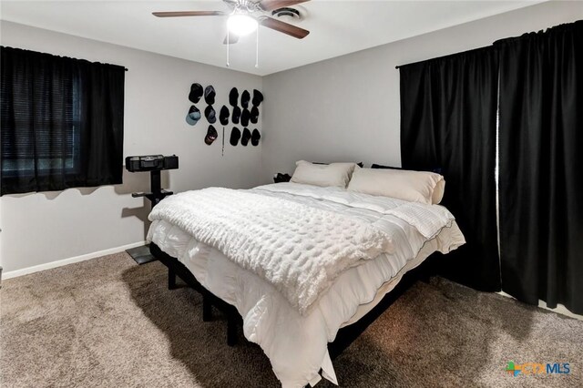 1808 Mission Dr, Victoria, TX 77901 - carpeted bedroom featuring baseboards and ceiling fan