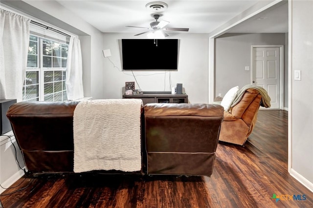 1808 Mission Dr, Victoria, TX 77901 - living room featuring wood finished floors, a ceiling fan, and baseboards