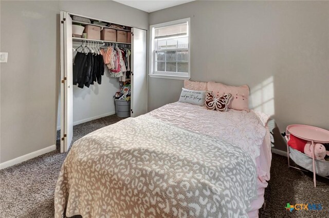 1808 Mission Dr, Victoria, TX 77901 - carpeted bedroom with baseboards and a closet