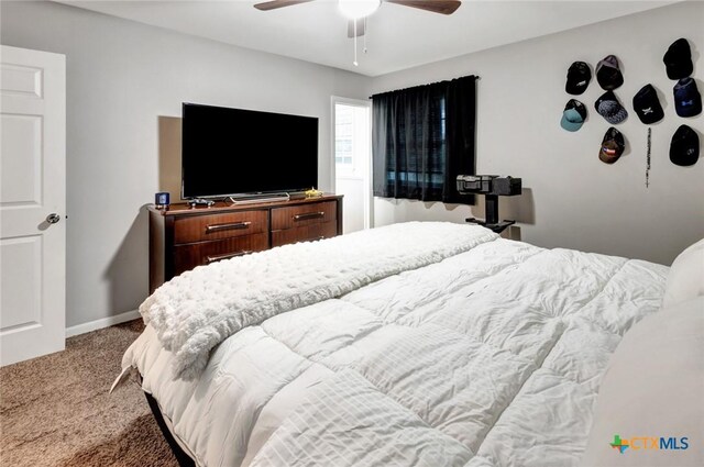 1808 Mission Dr, Victoria, TX 77901 - bedroom with carpet and ceiling fan