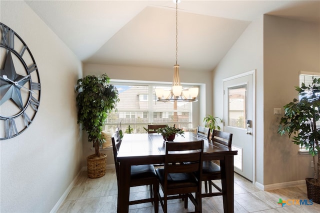 521 Kirkhill St, Hutto, TX 78634 - dining room with lofted ceiling, a chandelier, and baseboards