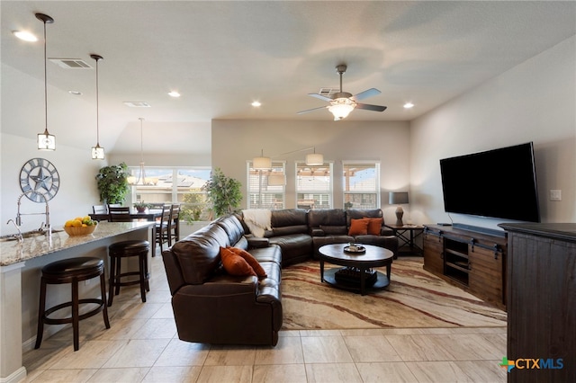 521 Kirkhill St, Hutto, TX 78634 - living room featuring a ceiling fan, healthy amount of natural light, recessed lighting, and light tile patterned flooring