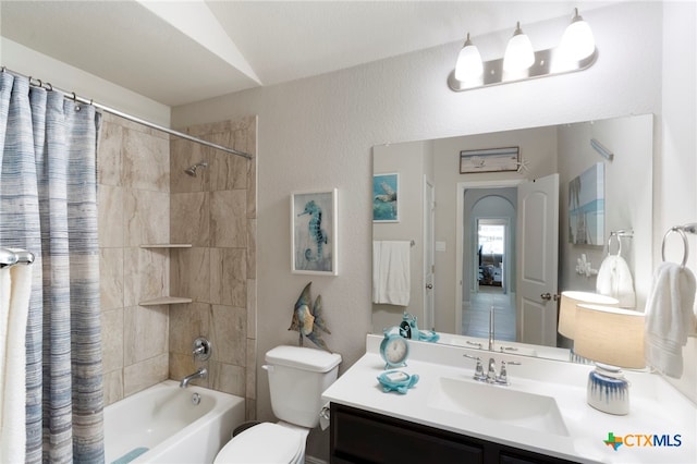 521 Kirkhill St, Hutto, TX 78634 - bathroom with shower / tub combo with curtain, toilet, vanity, and lofted ceiling