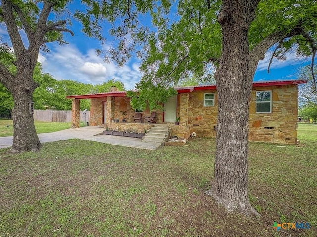 1003 Standifer St, Lampasas, TX 76550 - single story home featuring stone siding