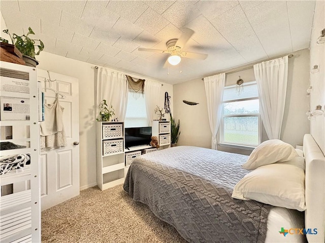 1003 Standifer St, Lampasas, TX 76550 - bedroom with light carpet and ceiling fan