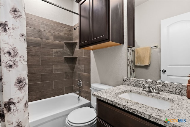 full bathroom featuring toilet, shower / tub combo, and vanity